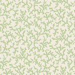 Green leaf pattern on a beige background