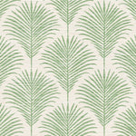 Pattern of green palm leaves on a beige background
