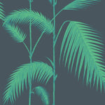 Teal palm leaves on a dark blue background