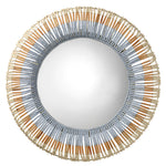 Round mirror with a decorative frame made of wooden sticks and beads on a white background