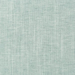 Textured patterned fabric swatch in a light green blue color