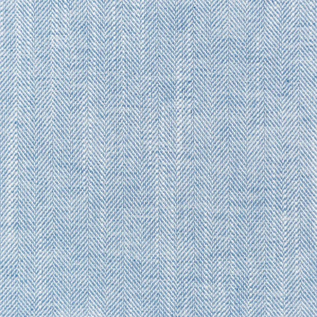 Blue herringbone patterned fabric texture