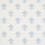 Pattern of blue geometric shapes on a light gray background