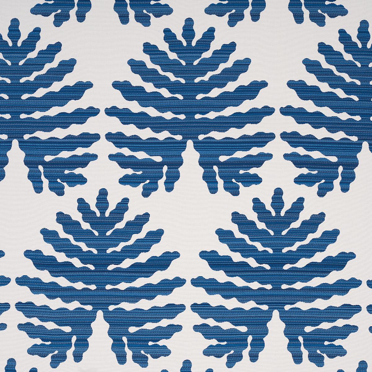 Tropical blue leaves on a white performance fabric