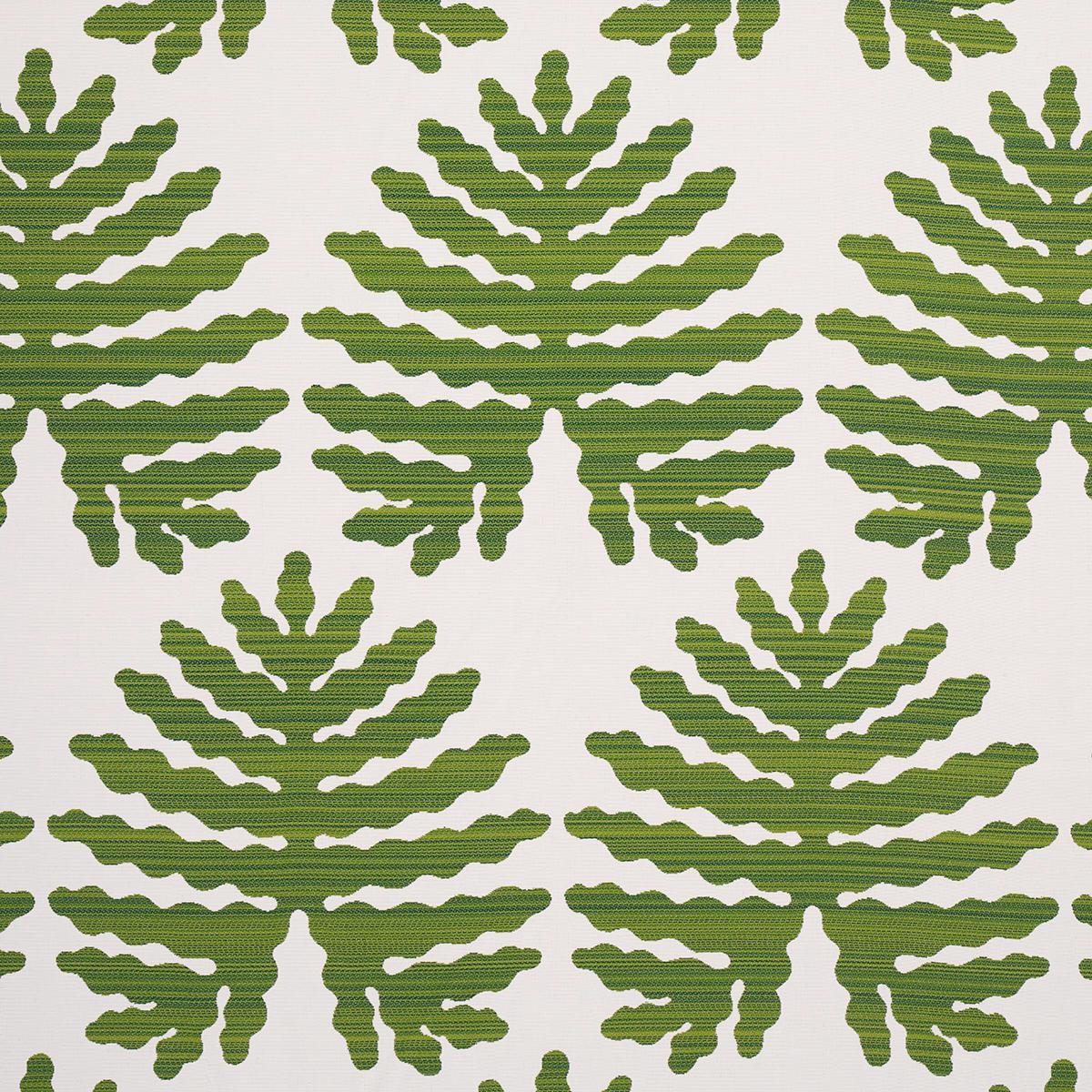 Tropical green leaves on a white performance fabric