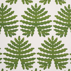 Tropical green leaves on a white performance fabric