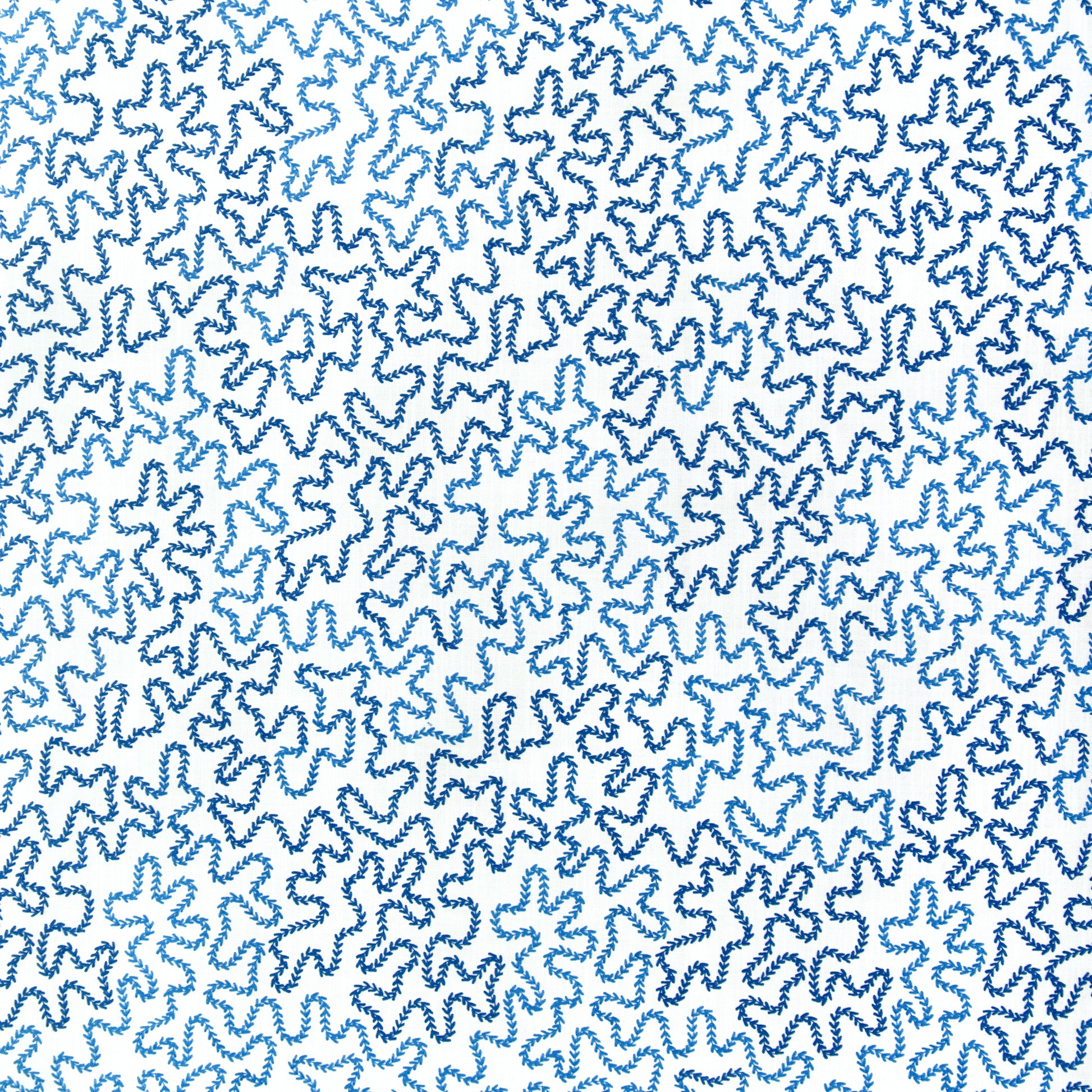 Blue wavy pattern on a white fabric