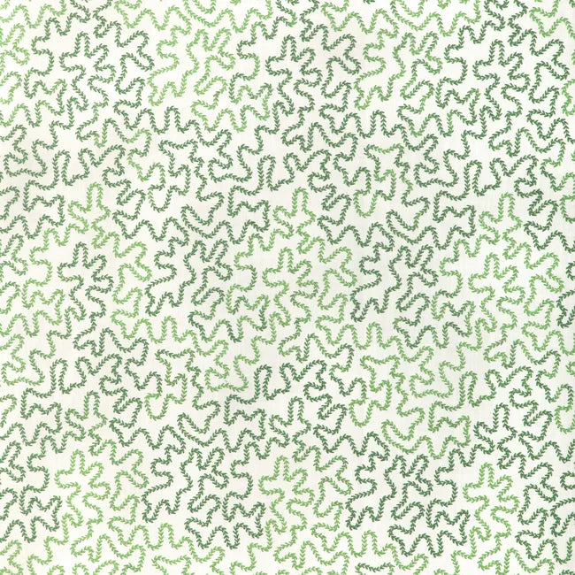 Wavy line pattern in green on a white fabric