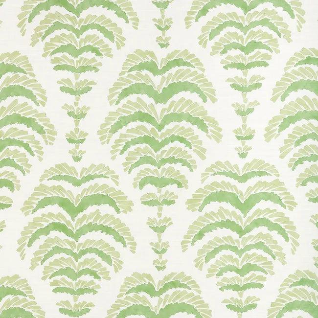 a green abstract botanical motif on white fabric 