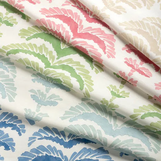 multiple samples featuring colorful abstract botanical motif on white fabric 