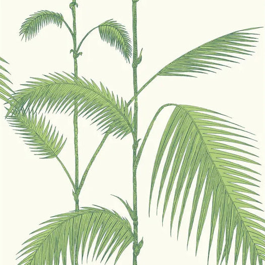 Green palm leaf design on a white background