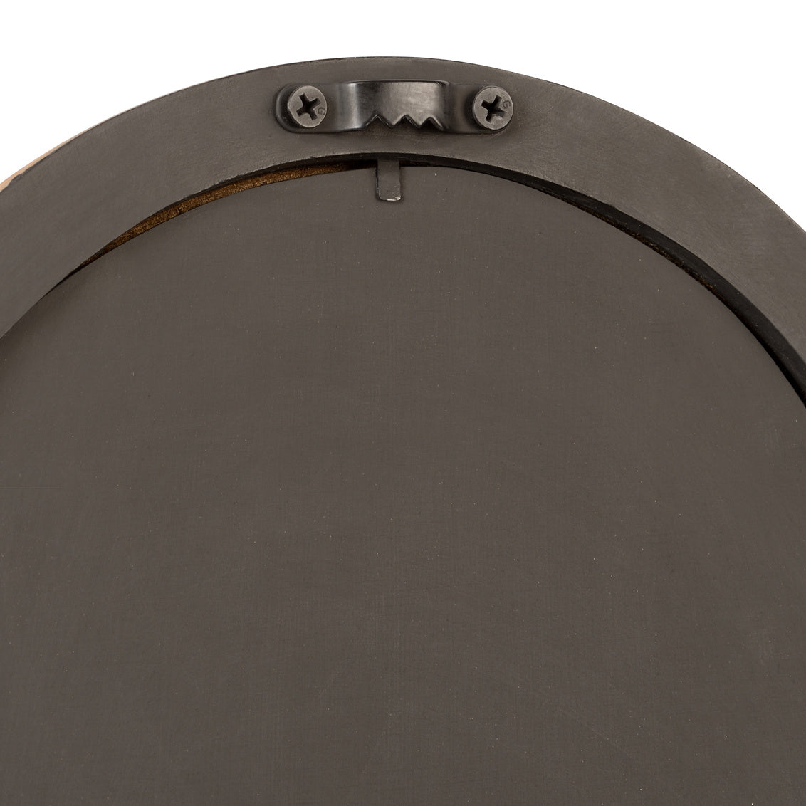 Close-up of the back of a round wall mirror with a dark metal mounting bracket and two visible screws on a white background.