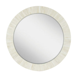 Round mirror with a decorative beige frame on a white background