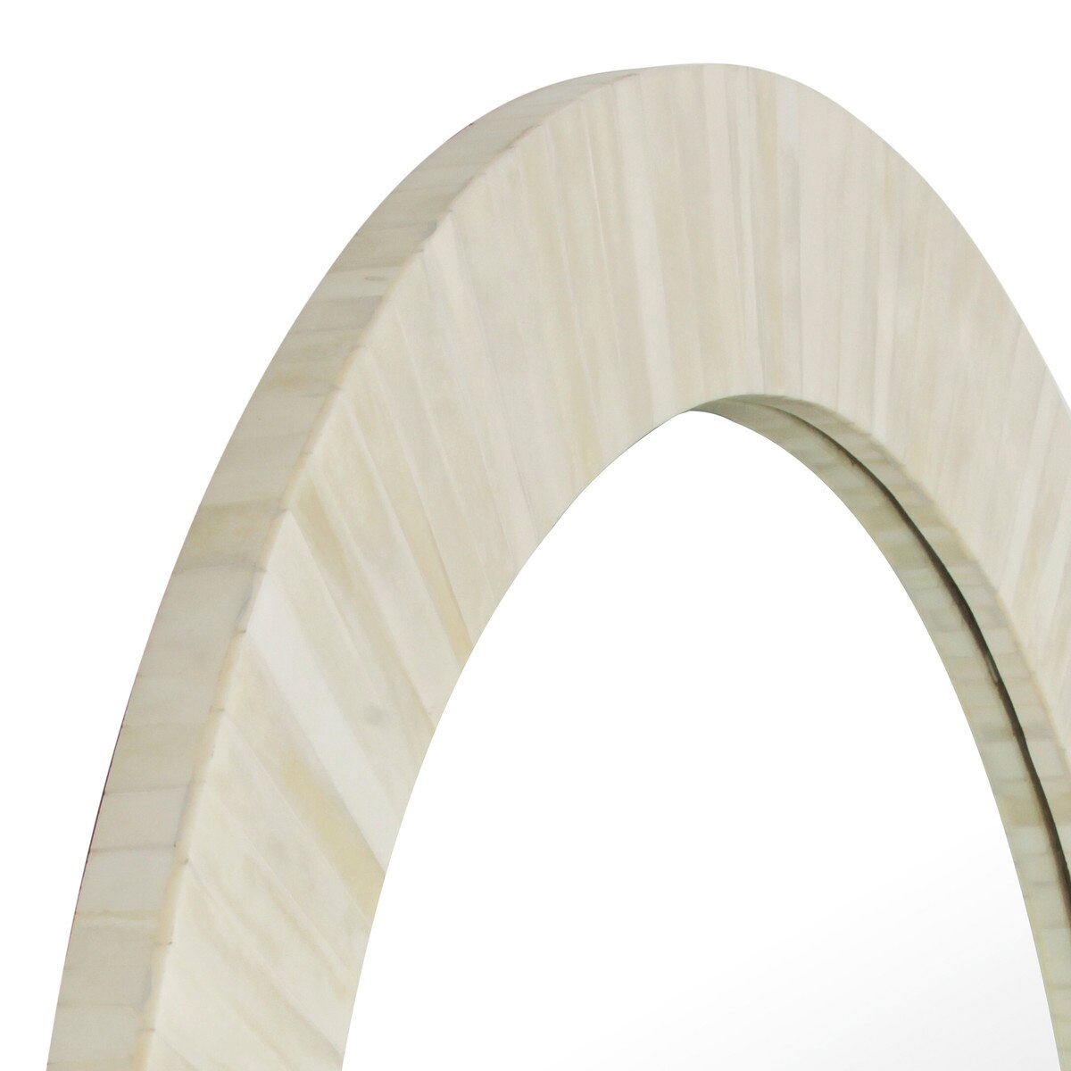 Close-up of a wooden mirror frame with a white background