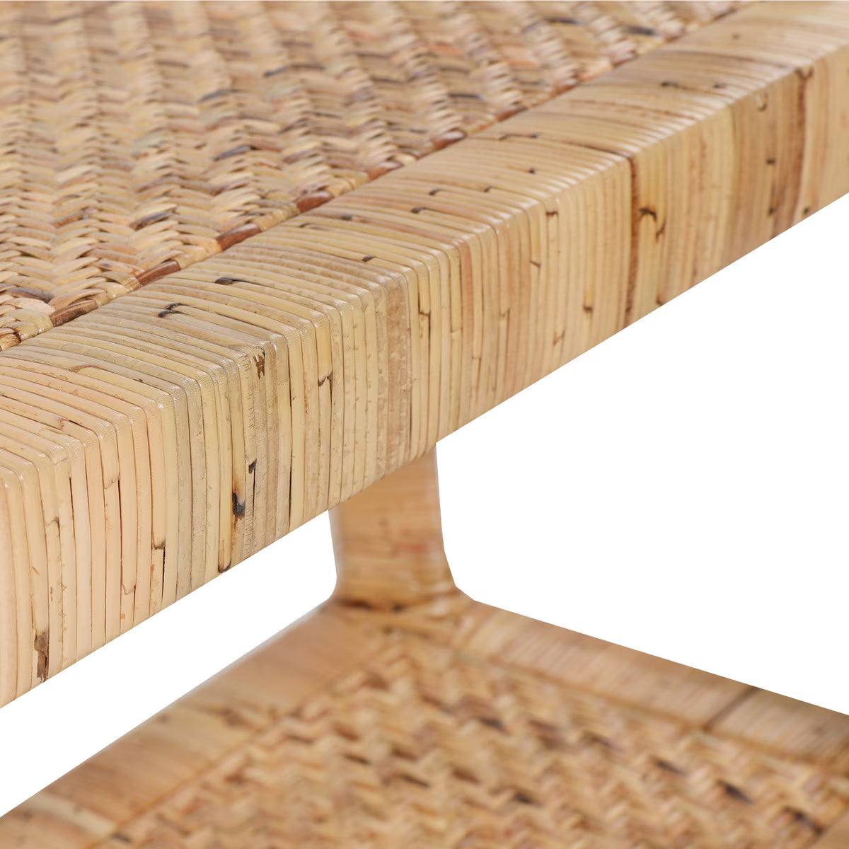 Close-up of a rattan bench and table corner on a white background