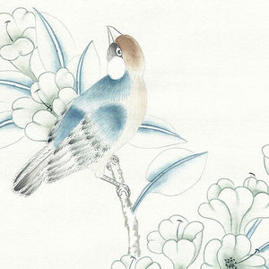 close up of mural of a bird perched on a branch with white flowers in the background