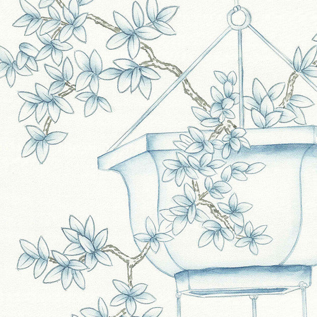 Decorative illustration of a hanging planter with floral branches on a white background