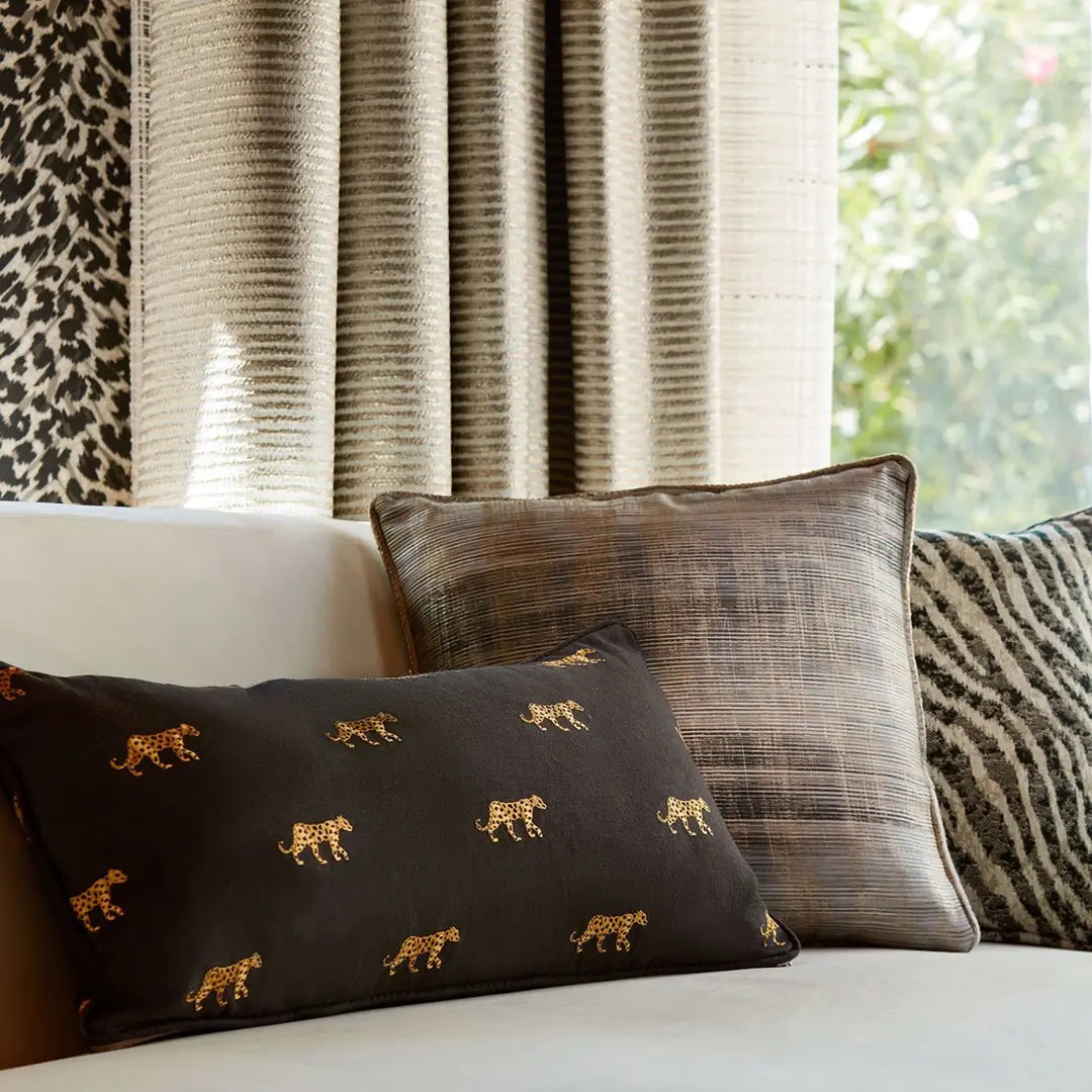 Decorative pillows with animal patterns on a couch