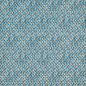 Patterned fabric with small blue circles on a beige background