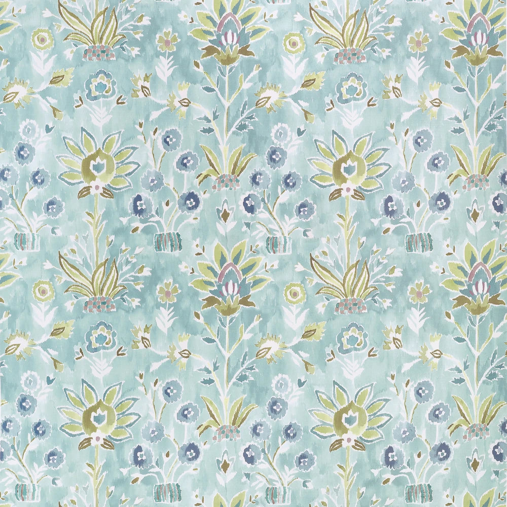 Floral patterned fabric with green and aqua flowers on a light blue background