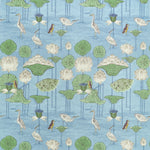 A repeating botanical pattern featuring white lotus flowers, green lily pads, and white cranes on a light blue water background, with small brown birds interspersed.