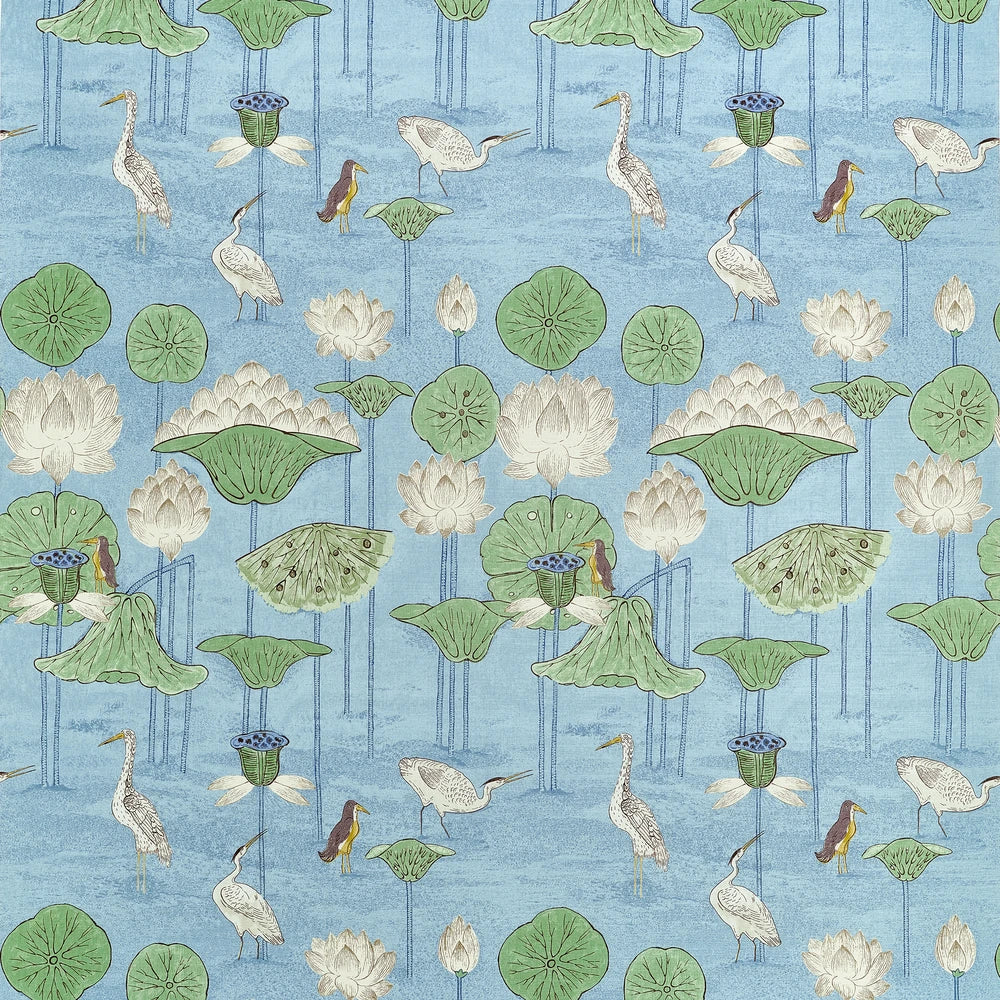 A repeating botanical pattern featuring white lotus flowers, green lily pads, and white cranes on a light blue water background, with small brown birds interspersed.