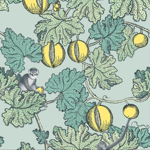 Decorative pattern with yellow fruits and green leaves on a light blue background