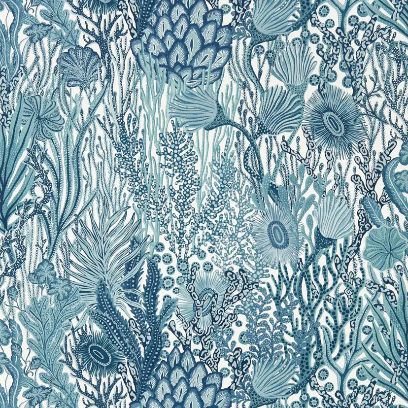 Pattern of blue seaweed and marine life on a white wallpaper