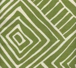 green and white geometric fabric