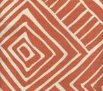 coral and white geometric fabric