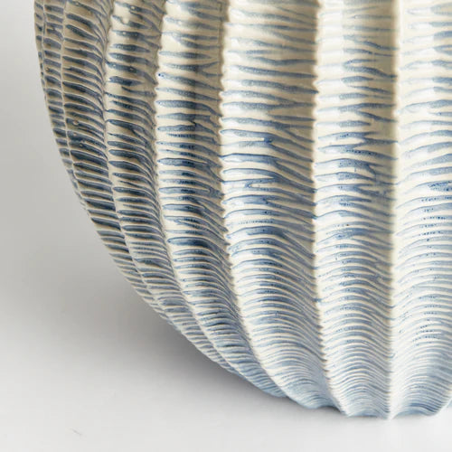 Close up of texture of blue and white garden stool 