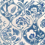 Patterned wallpaper with floral design in blue on a white background
