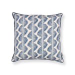 Decorative pillow with blue and white pattern on a white background