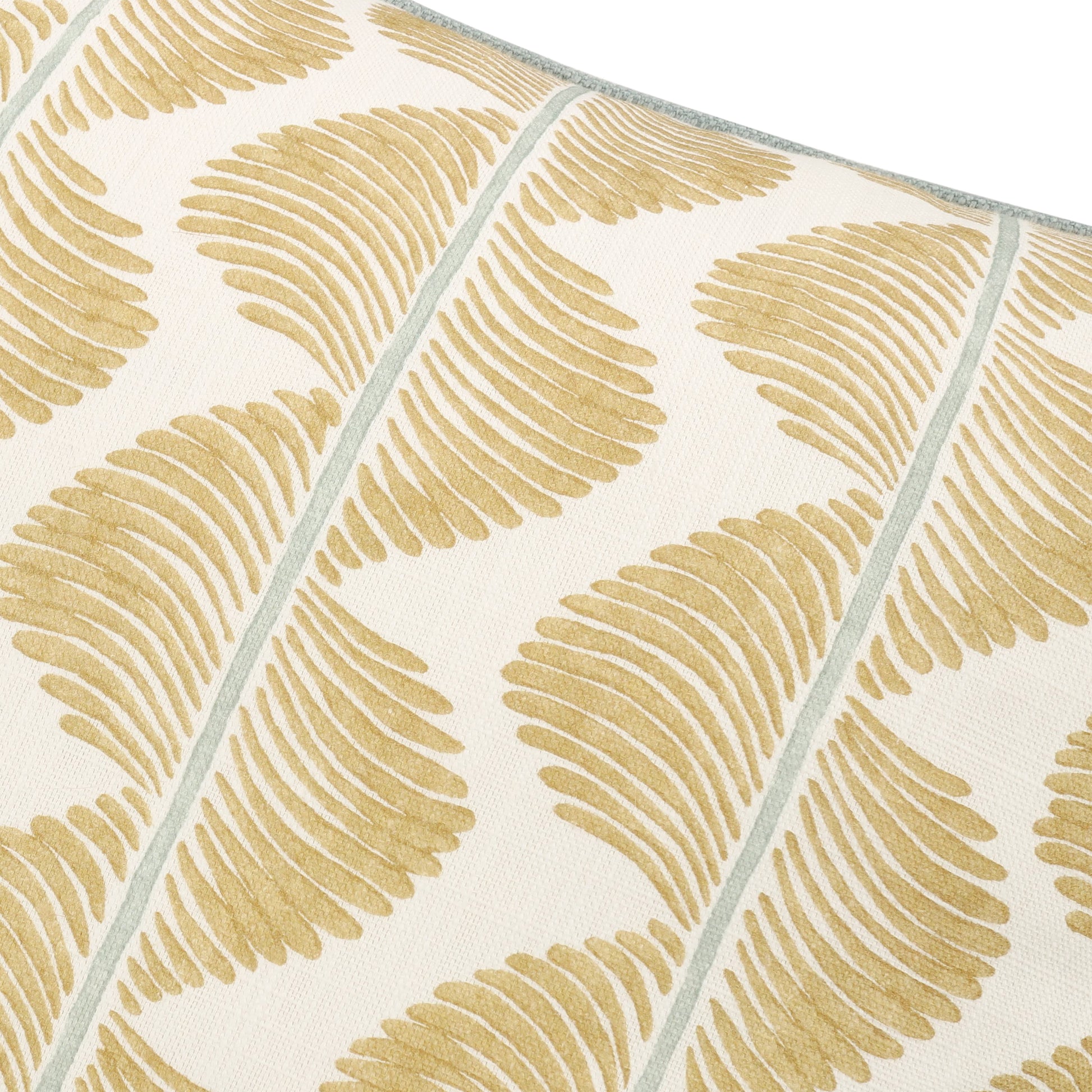 Patterned fabric with yellow leaf design on a white background