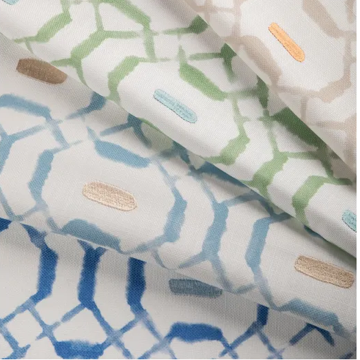 Four fabric swatches with different patterns and colors on a white background