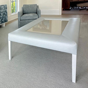 Rounded Upholstered Cocktail Table