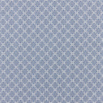 Patterned fabric with a geometric design on a blue background