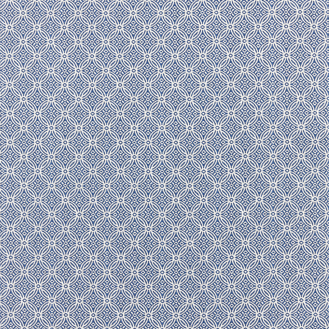 Patterned fabric with a geometric design on a blue background