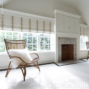 A fabric featuring a geometric acanthus leaf stripe pattern in beige. Installed on roman shades 