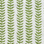 Pattern of green leaf-like shapes on a white background