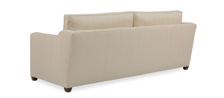 A light beige upholstered loveseat or sofa shown from a three-quarter angle on a plain white background.