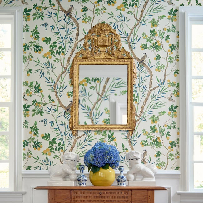 a bright chinoiserie paper in an entry 