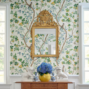 a bright chinoiserie paper in an entry 