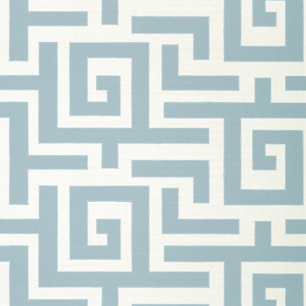 Pattern of interlocking shapes in light blue and white