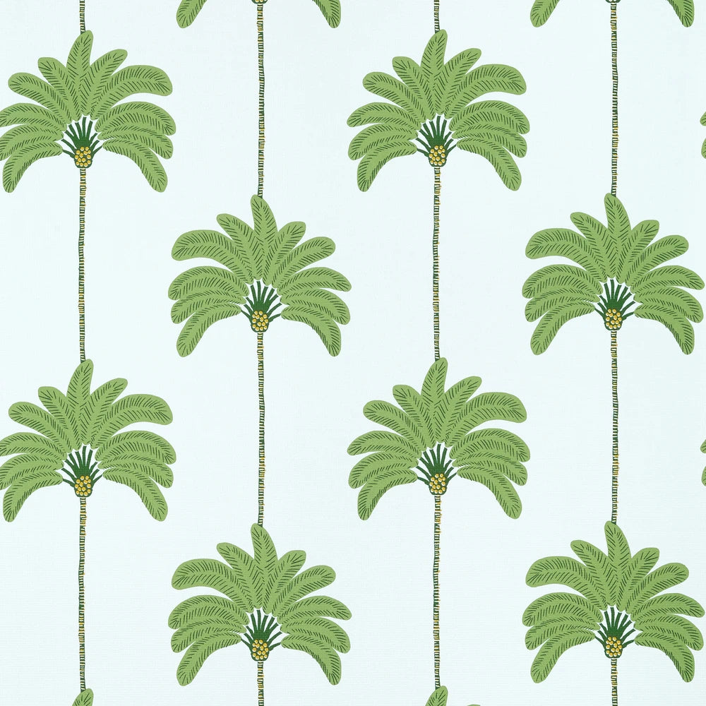 Pattern of green palm trees on a light blue background