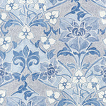 Blue and white floral damask wallpaper pattern with a repeating ornate botanical design on a textured light gray background.