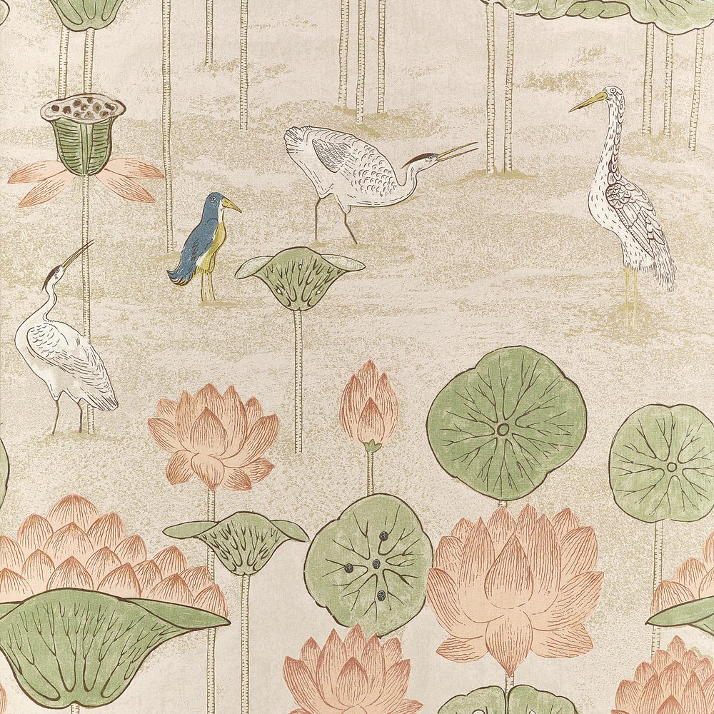 A repeating botanical and bird pattern on a light warm beige background, featuring lotus flowers in soft pink, green lily pads, and several white and blue birds among tall thin tree-like stems.