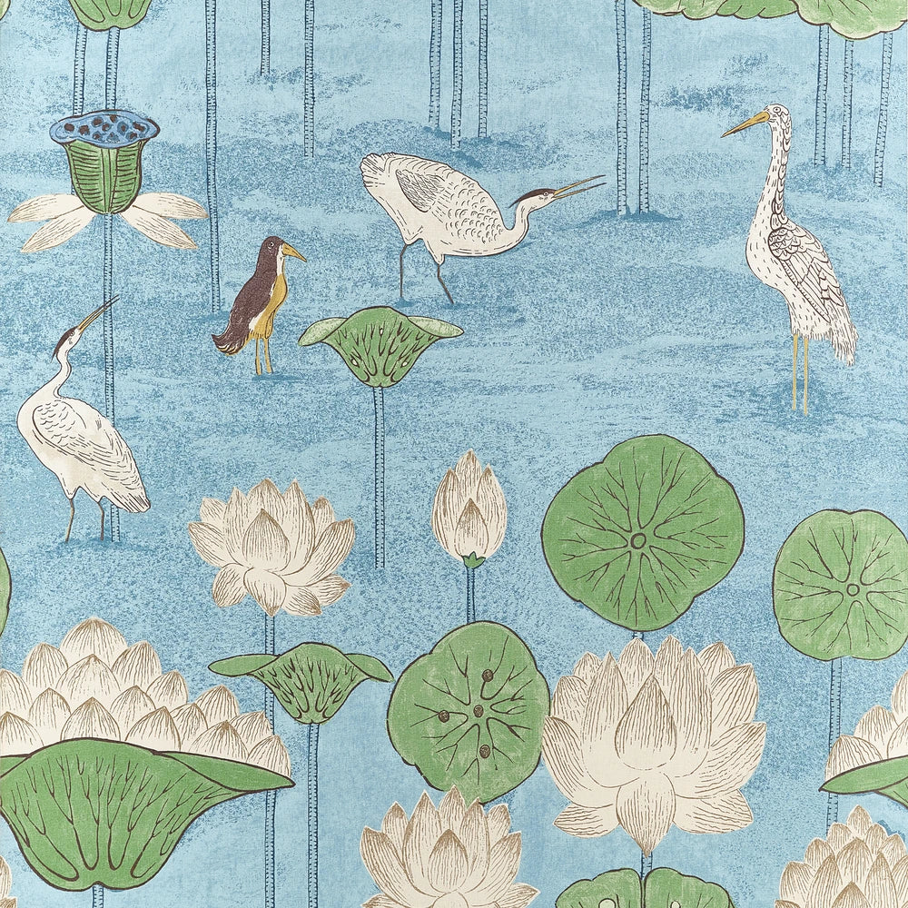 A repeating botanical and bird pattern on a light blue background, featuring white cranes, green lily pads, white lotus flowers, and a small brown bird.