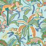 Colorful pattern of lizards and palm trees on a blue wallpaper
