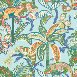 Colorful pattern of lizards and palm trees on a blue wallpaper